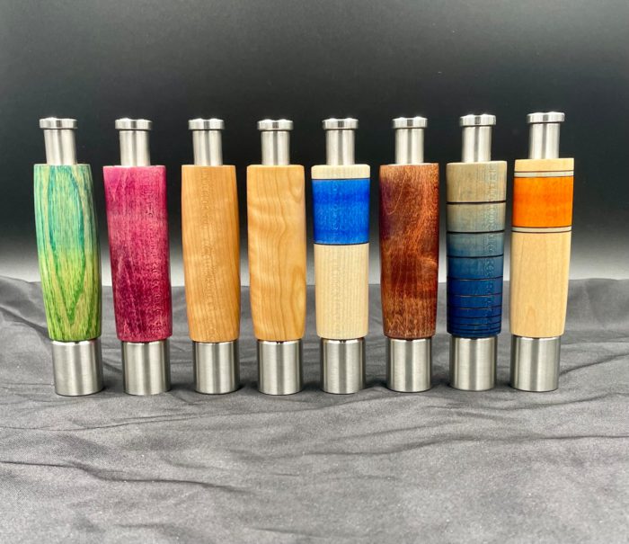 colorful and one handed pepper mill handcrafted by etsy shop wildwoods woodturning in praise of pretty pepper mills