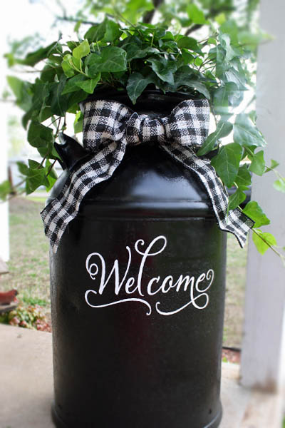 milk can plant holder and welcome sign for front porch from tanya's creative space on the happy list