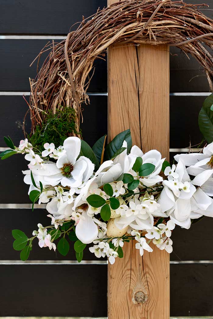 spring magnolia wreath with dollar store flowers from craftberry bush on the happy list