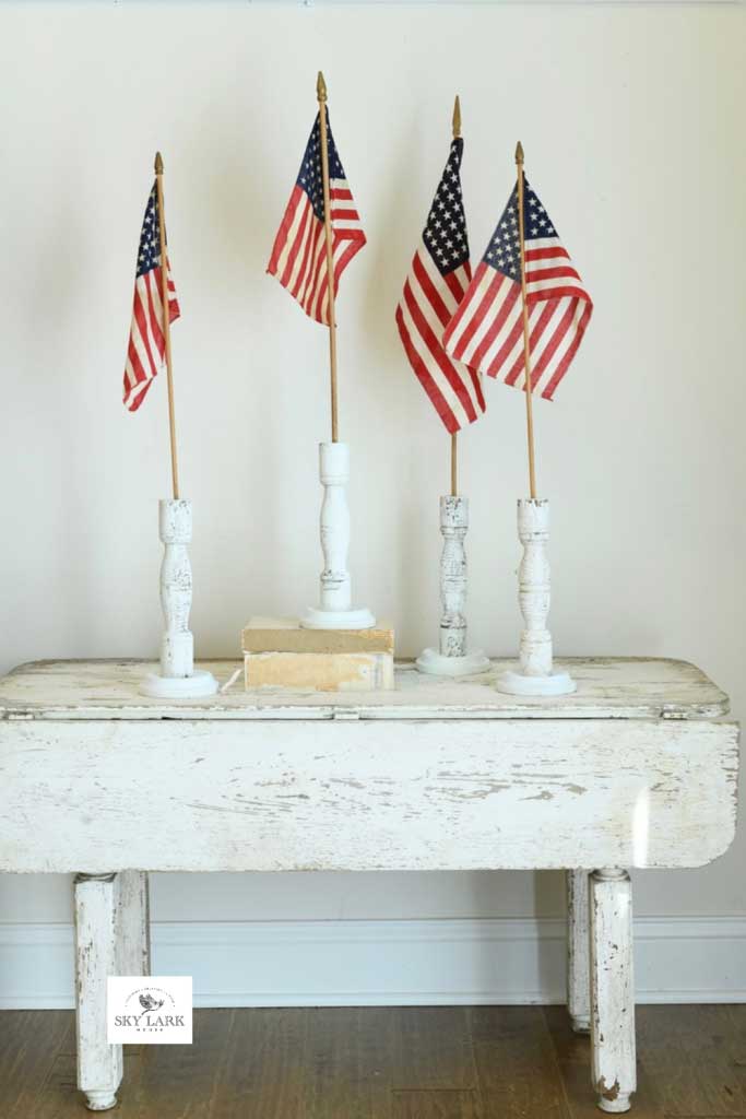 diy small flag holder using spindles from sky lark house on the happy list