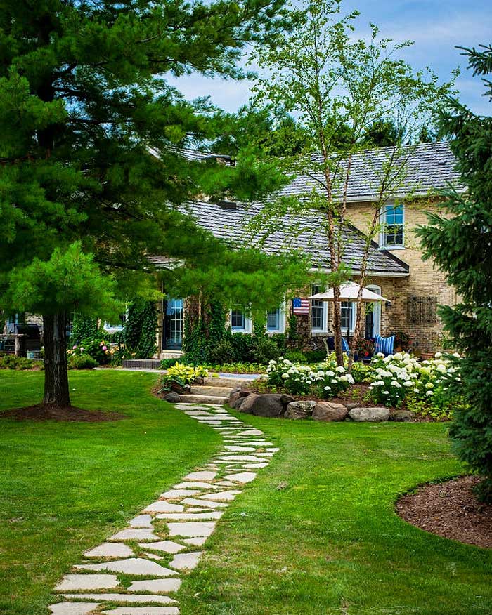 American landscape award winning landscape design for historic home in wisconsin via town and country living on the happy list