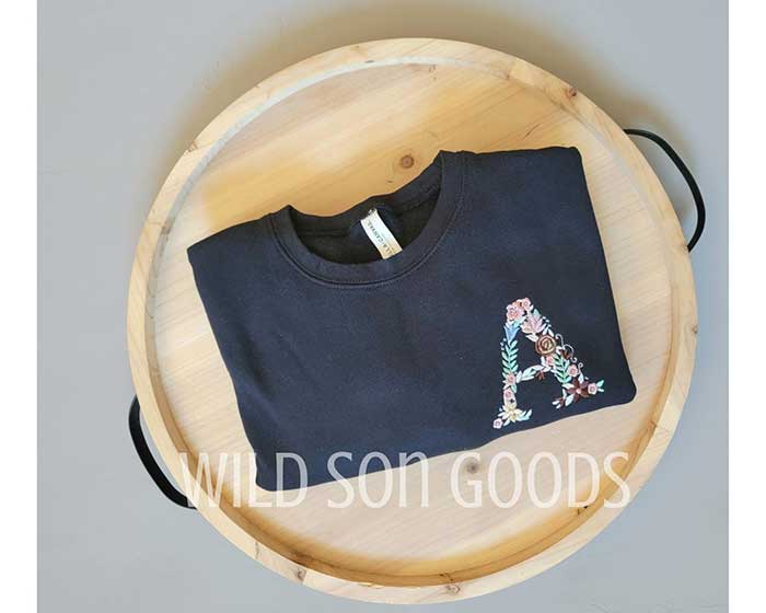 monogram sweatshirt with flowers from wild son goods via etsy