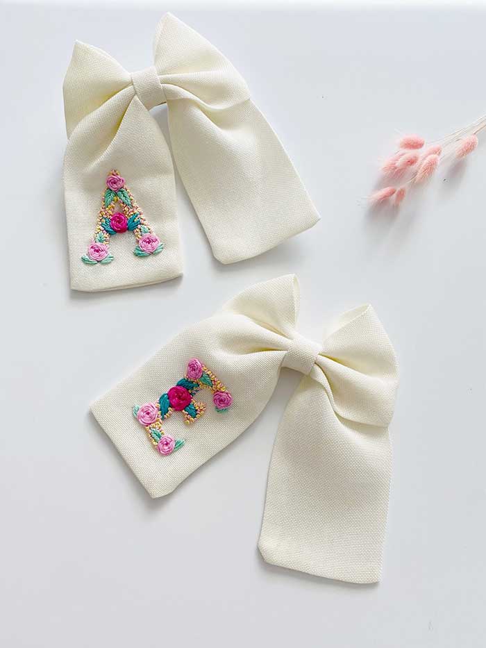 embroidered hair bow from teeny weeny things uk via etsy