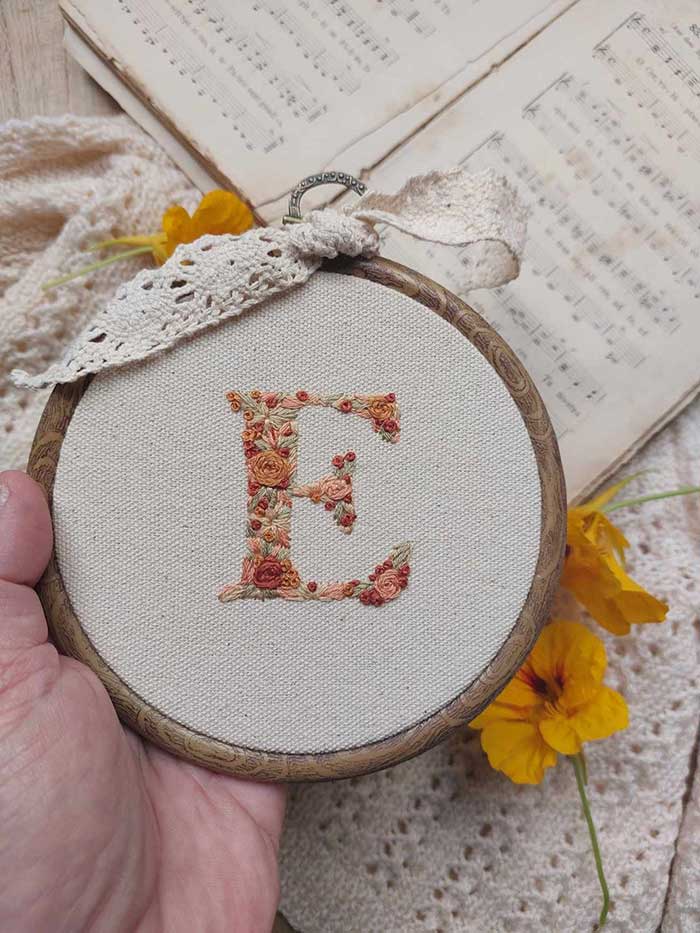 floral embroidered letter from needle and loop store via etsy 