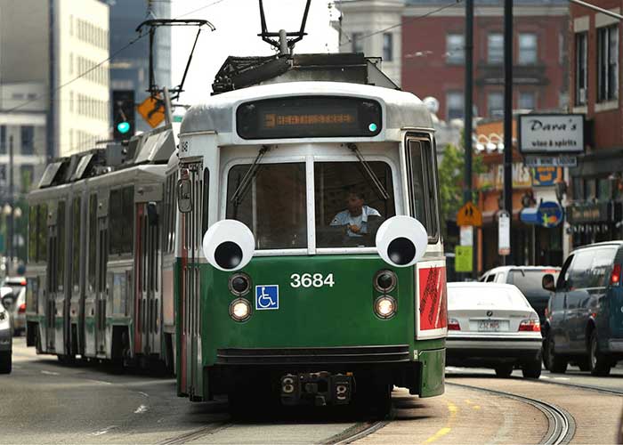 boston train with googly eyes via MBTA and boston herald on the happy list