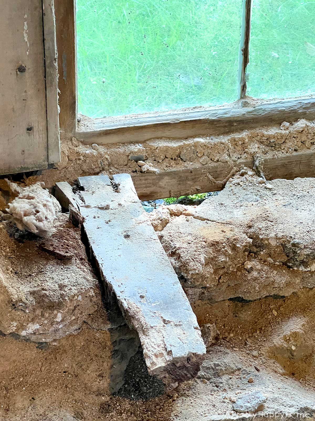 Wood In a Stone Wall strips of wood embedded in a stone wall for a wood windowsill to attach to