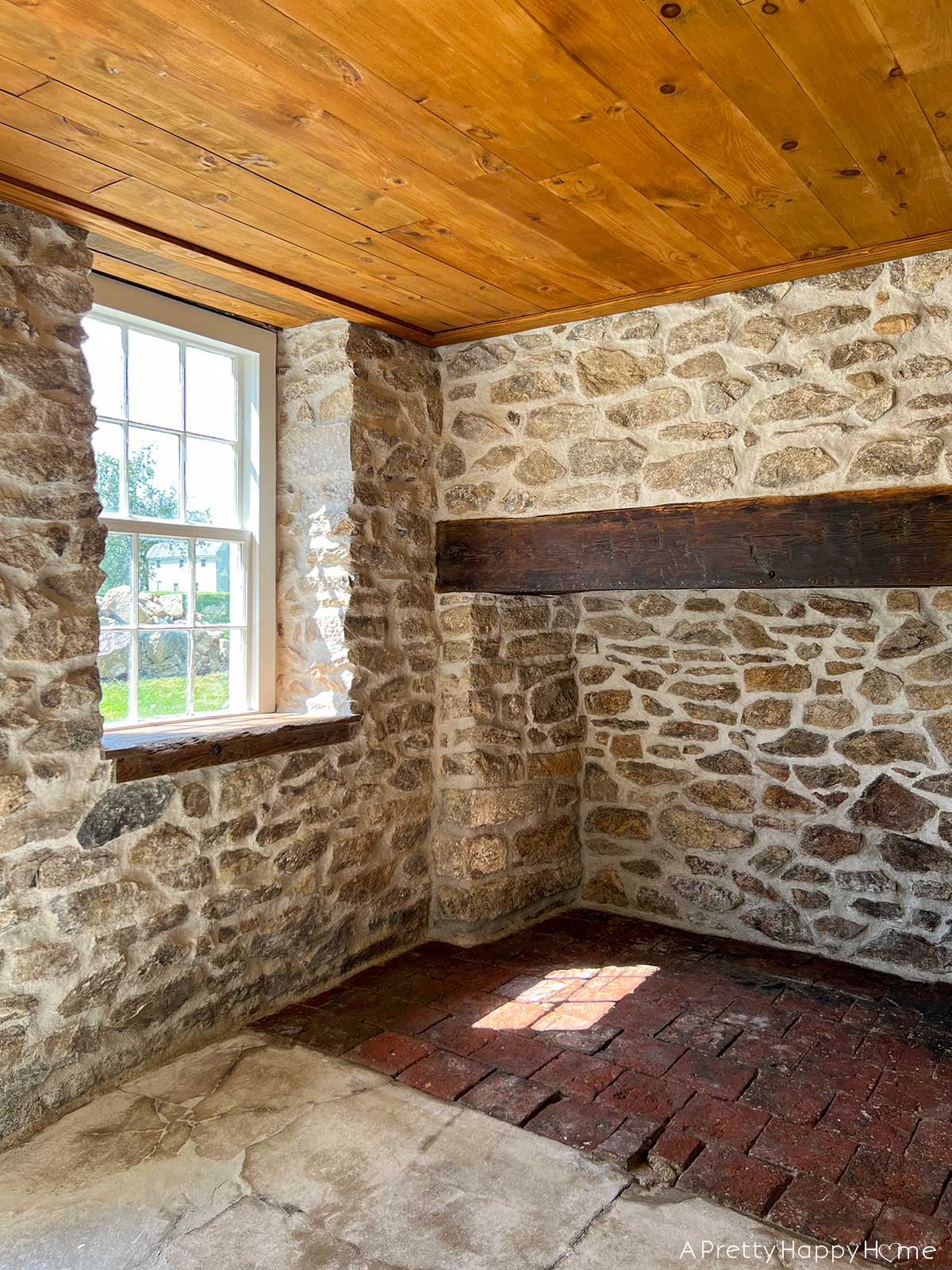 250 year old carriage house terracotta floor tiles hidden under dirt and revealed by scrubbing with water