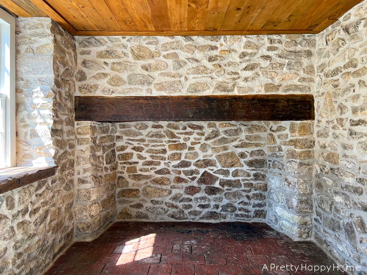 stone carriage house restoration stone fireplace with wood mantel in 18th century carriage house