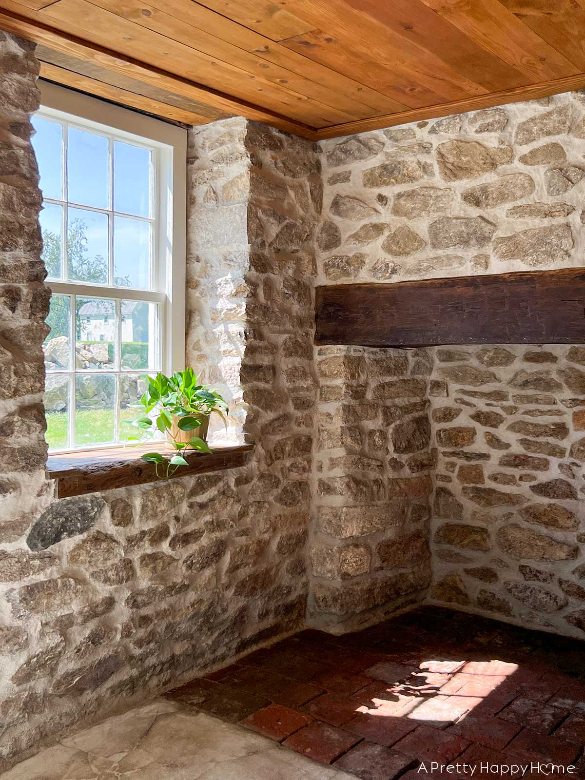 stone carriage house restoration stone fireplace with wood mantel in 18th century carriage house