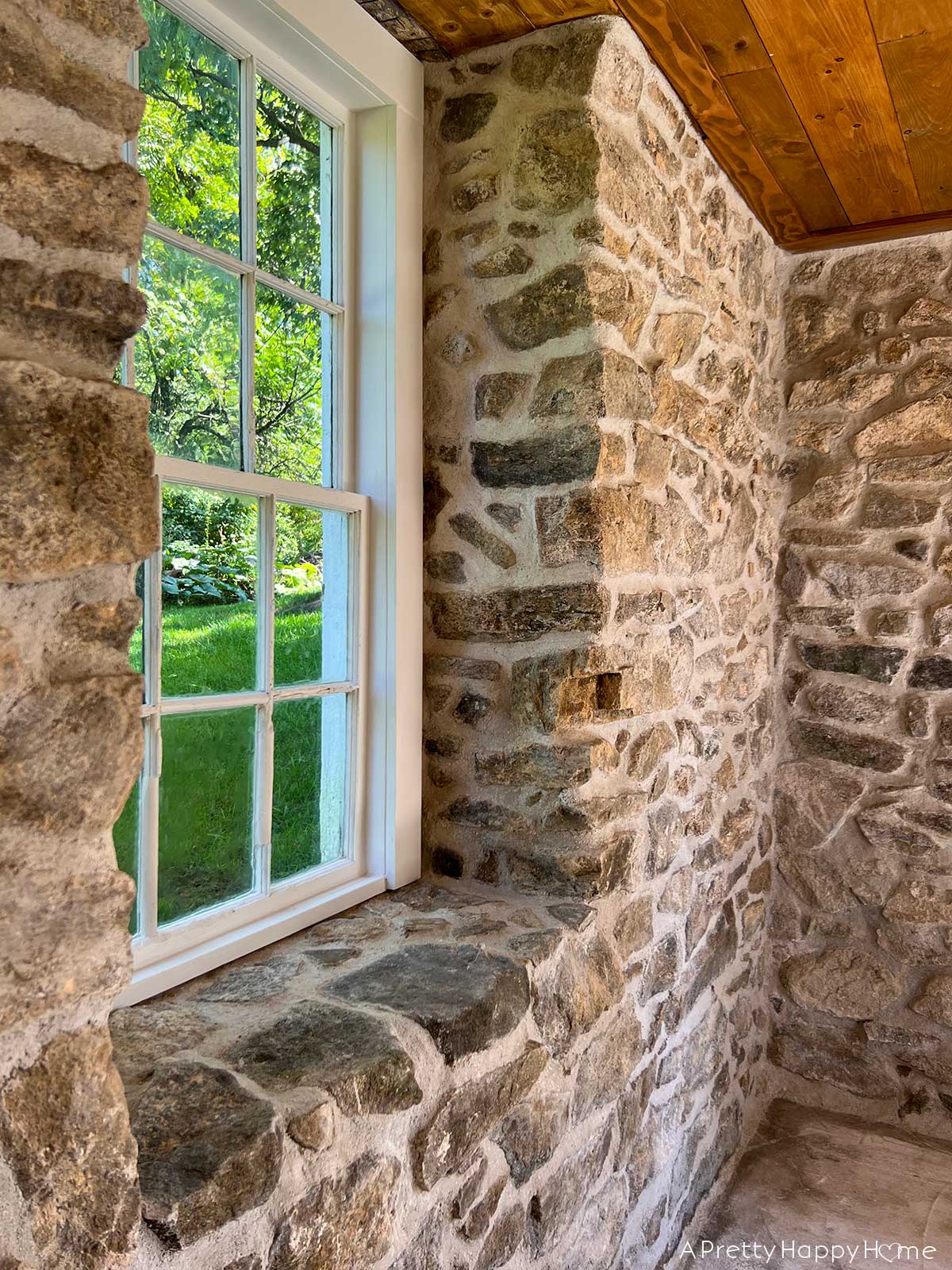 stone carriage house restoration stone fireplace with wood mantel in 18th century carriage house