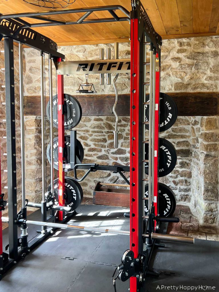 carriage house gym with ritfit smith machine