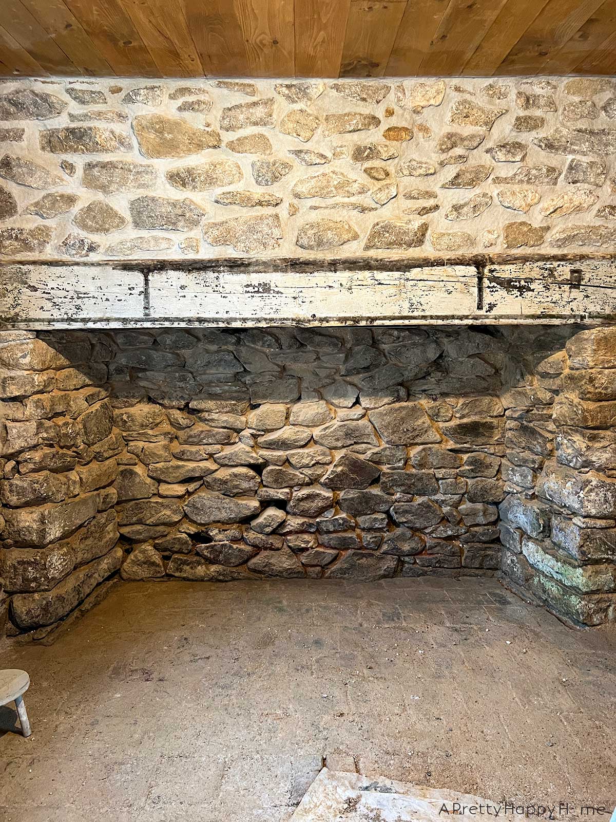 250 year old carriage house terracotta floor tiles hidden under dirt and revealed by scrubbing with water