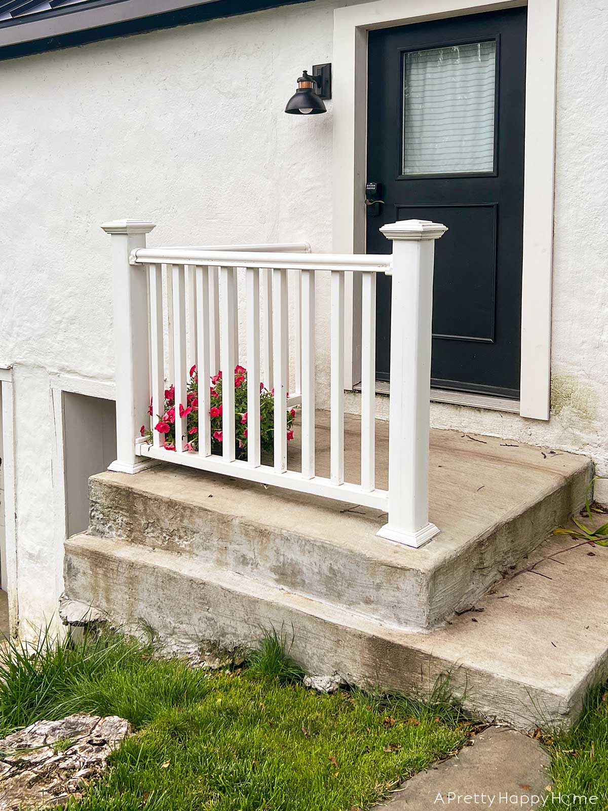 BEFORE PHOTO fieldstone porch made with fieldstone and lime mortar skimmed over concrete on a 250-year-old carriage house