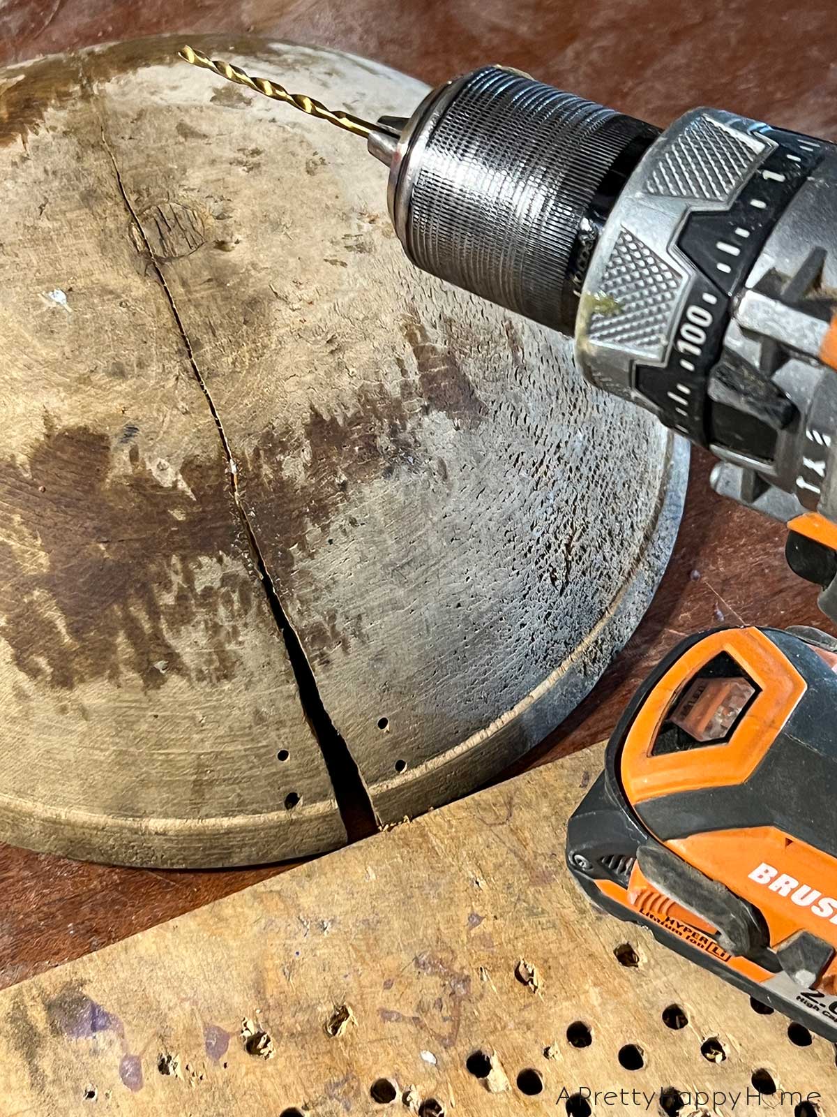 creative way to fix a cracked wood bowl with leather laces 