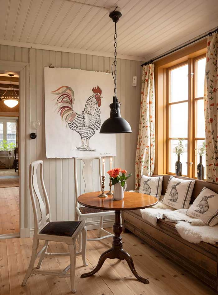 historic swedish dinging area in a home with a wooden bench via the Nordroom on the happy list