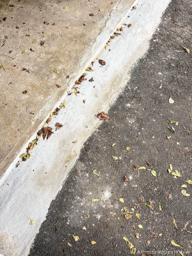 how to fix broken concrete by a garage door 