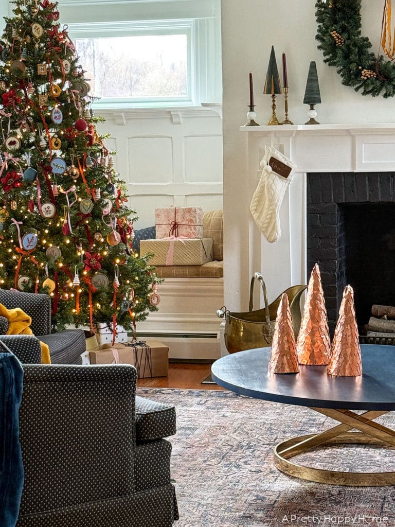 2024 Christmas Tree with embroidered flower ornaments macrame ornaments and ribbon in an old colonial farmhouse