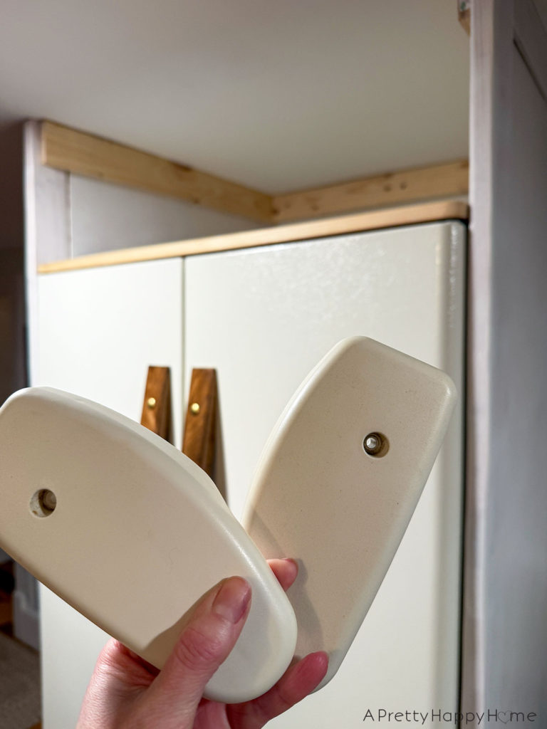 Building In Our Fridge: Four Ways To Customize A Fridge shaker style cabinet around fridge using tongue and groove construction. remove plastic hinge covers on top of fridge and make new wood hinge cover