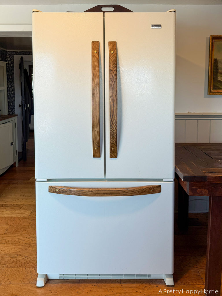 building in a fridge so that it looks panel ready and custom refrigerator with wood handles