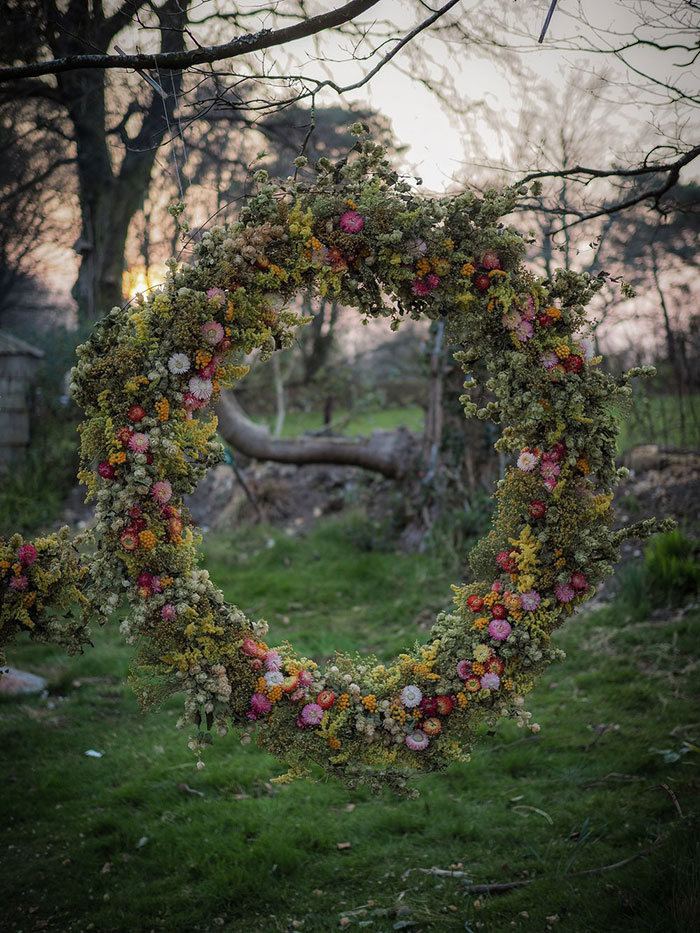 botanical tales circular flower installation from the uk on the happy list