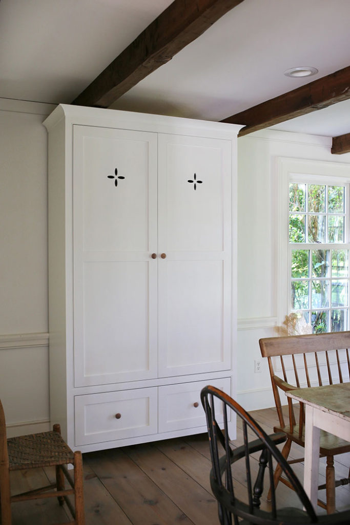 stained wood knobs on a vintage pantry cabinet by megan miller in praise of wood knobs and pulls