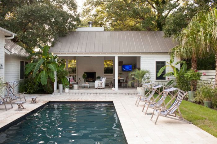 pool lounge area with champagne-colored metal roof photo by robert Brinson via BHG on the happy list