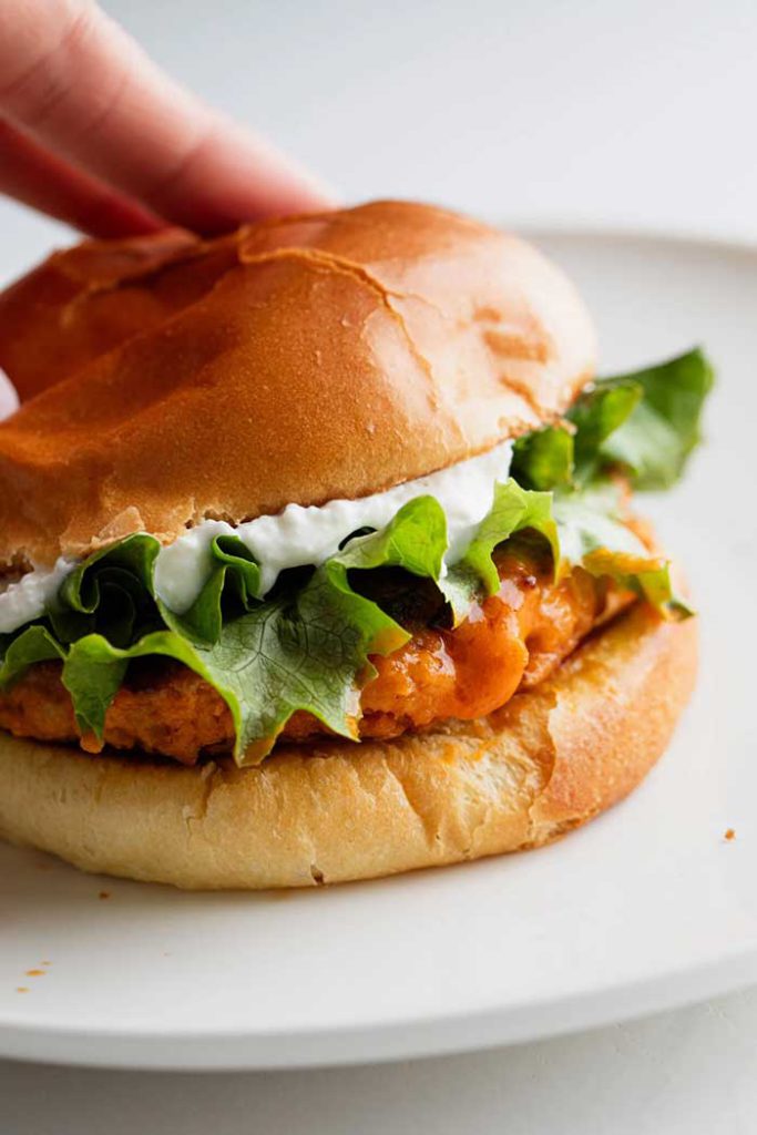 buffalo chicken burgers with whipped feta spread from pinch of yum on the happy list