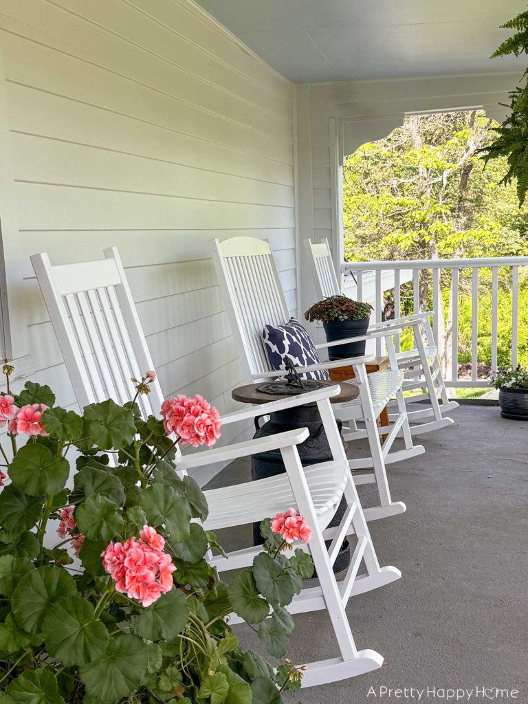 farmhouse front porch more seating with rockers and a light update