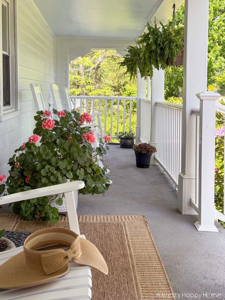 farmhouse front porch more seating with rockers and a light update
