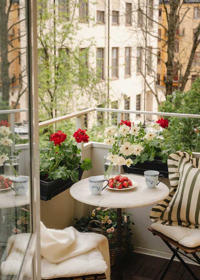 little swedish apartment with balcony seating Photo: Dana Ozollapa Styling: C Lindholm design For Historiska Hem via my scandinavian home