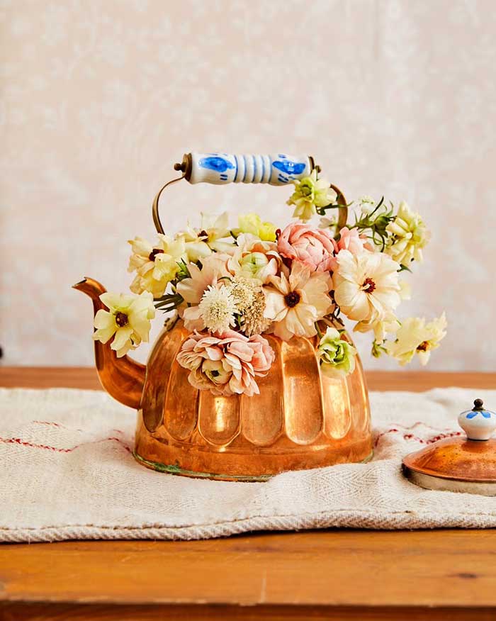 copper kettle as a vase idea photo ren fuller for county living magazine on the happy list