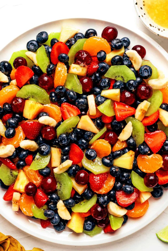 fruit salad with ginger lime dressing from gimme some oven on the happy list