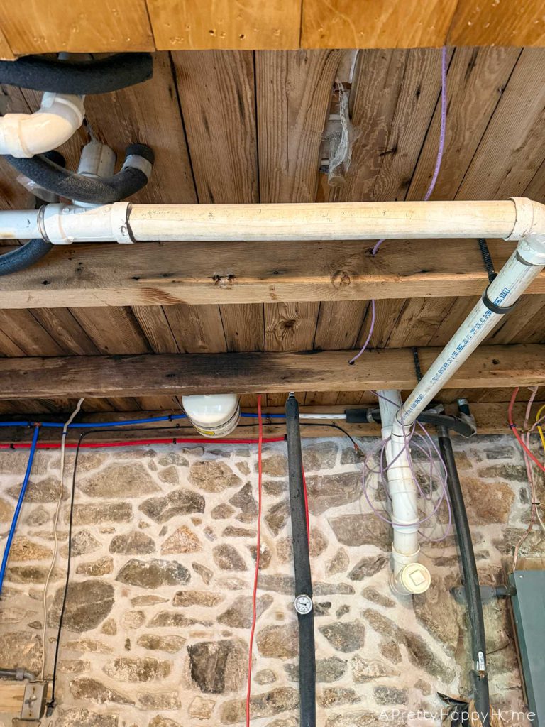 Stone Carriage House Gym: Part 9, The Ceiling rustic tongue and groove planked ceiling in a stone building