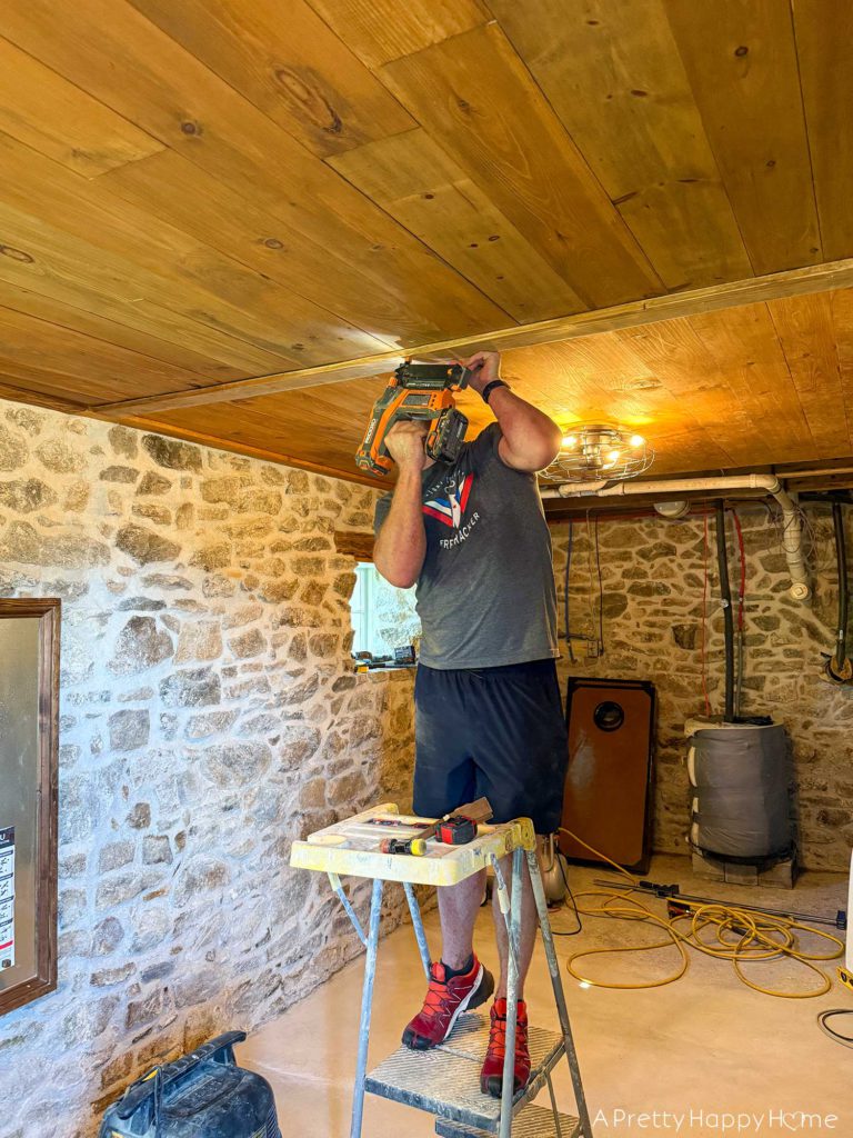 Stone Carriage House Gym: Part 9, The Ceiling rustic tongue and groove planked ceiling in a stone building