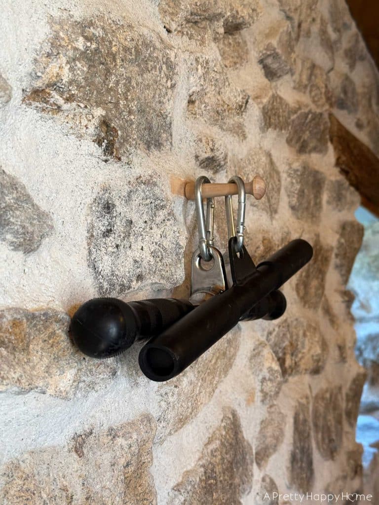 stone carriage house gym expansion home gym with stone walls and wood ceiling