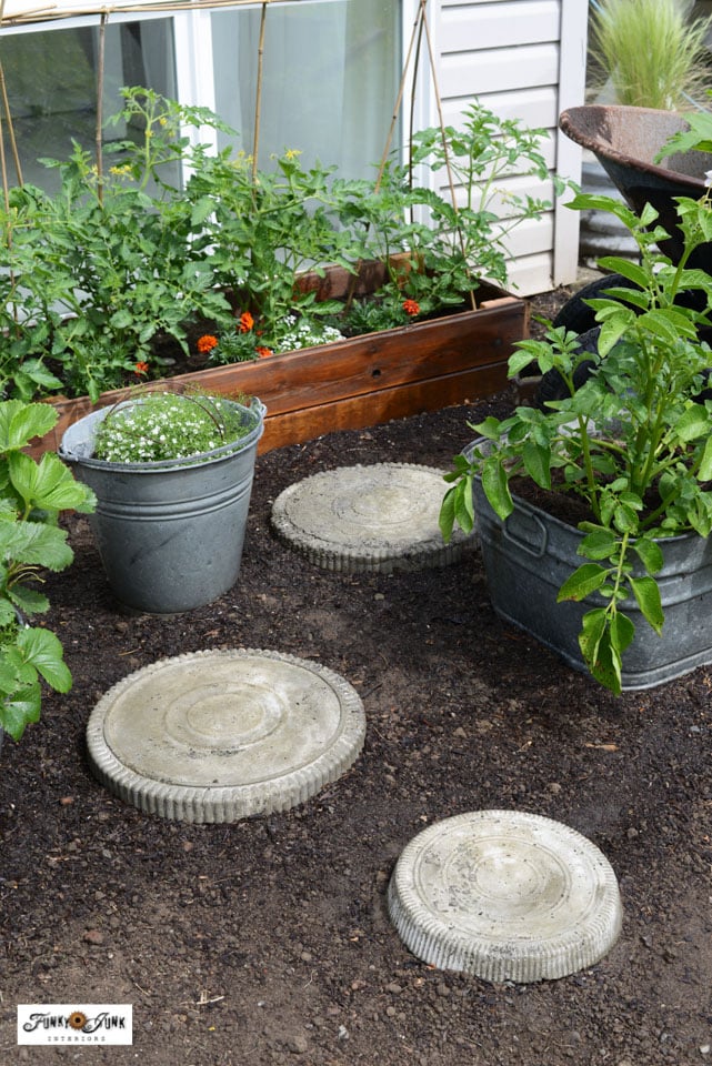 DIY concrete stepping stones from a party tray mold by Funky Junk Interiors on the happy list