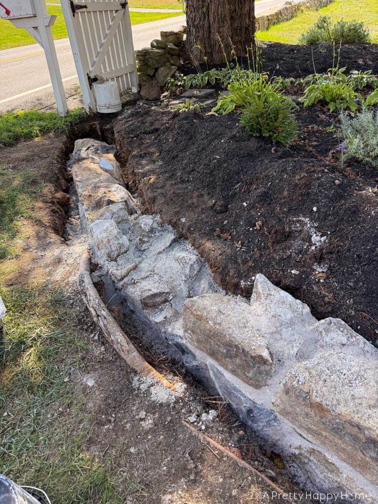 curved fieldstone wall DIY fieldstone wall consttruction historic masonry with lime mortar