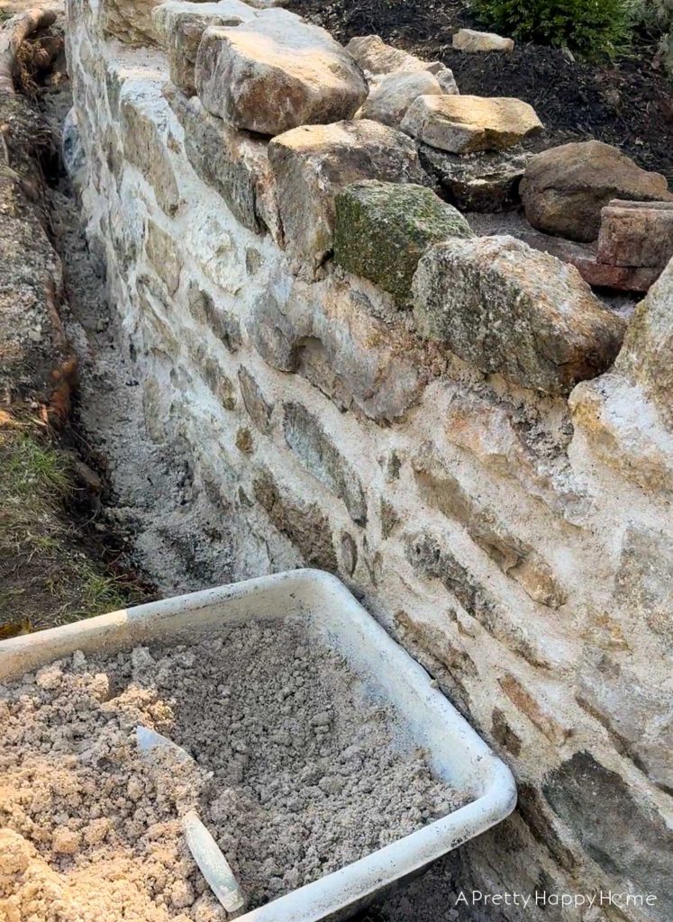 curved fieldstone wall DIY fieldstone wall consttruction historic masonry with lime mortar