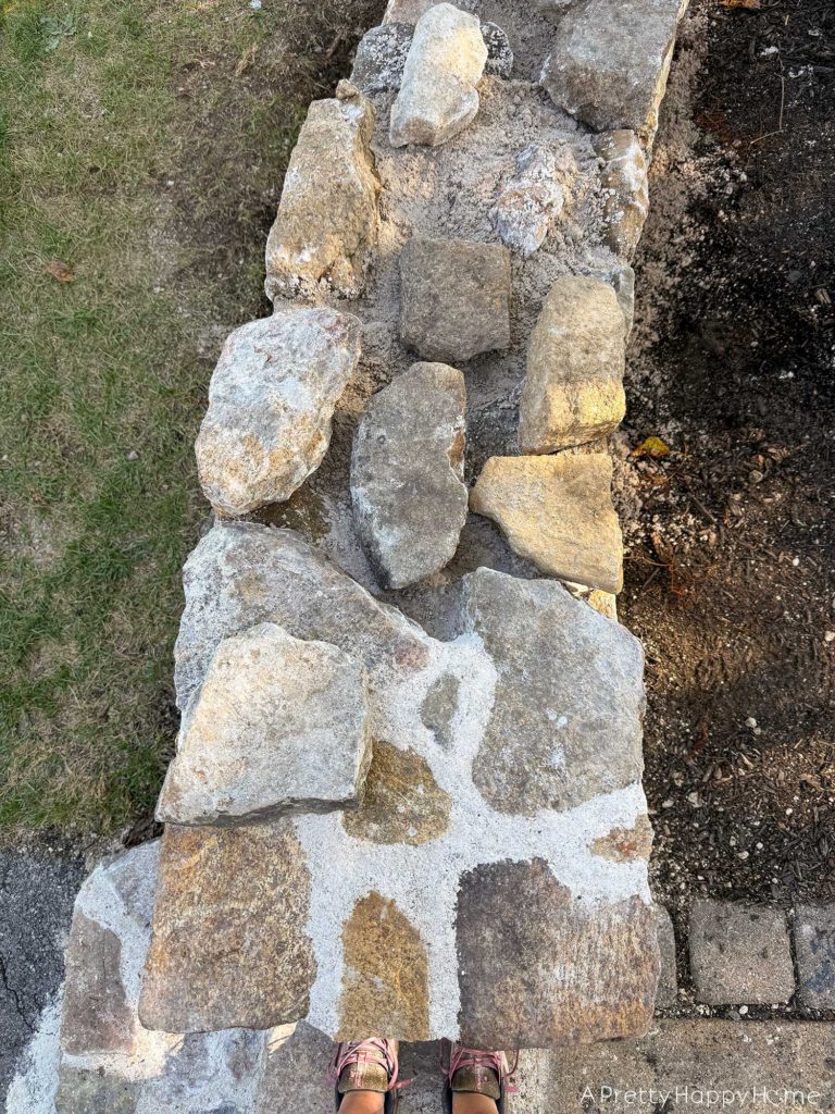 curved fieldstone wall DIY fieldstone wall consttruction historic masonry with lime mortar