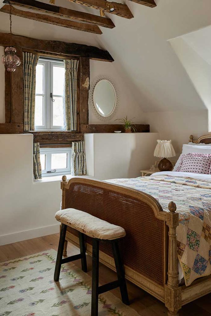 cottage with wood beams and double windows photo by chris snook for house and garden uk on the happy l list