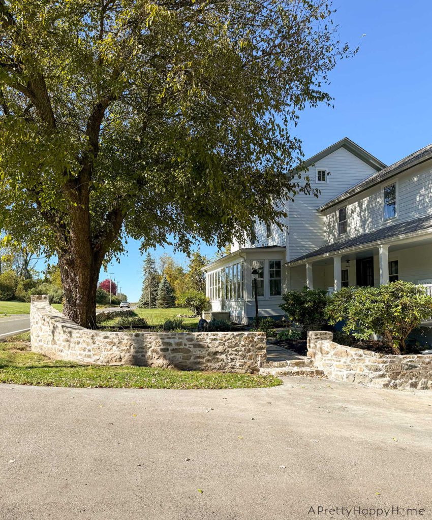 DIY curved fieldstone wall using historic masonry techniques and all fieldstone and lime mortar 