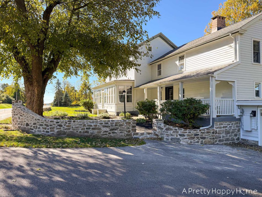 DIY curved fieldstone wall using historic masonry techniques and all fieldstone and lime mortar 