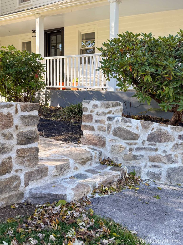 DIY curved fieldstone wall using historic masonry techniques and all fieldstone and lime mortar 