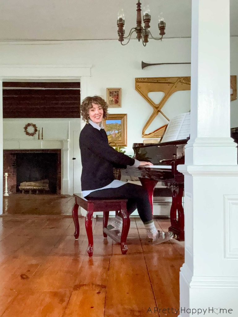 annisa olsson jones at piano music room decor ideas quirky music room decor with piano harp on the wall