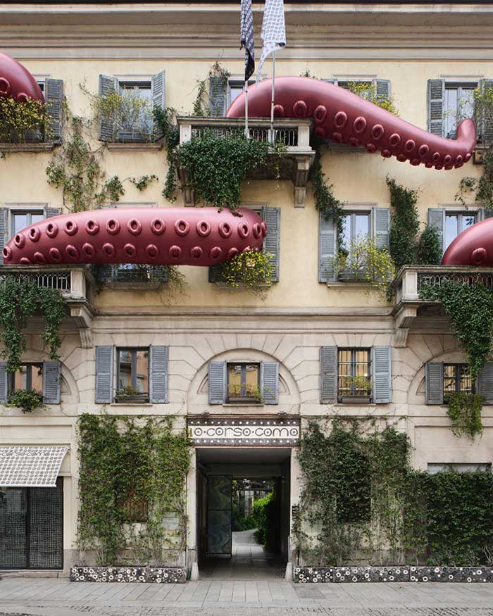 10 corso como building in milan decorated with huge balloon octopus tentacles coming out of the windows for design week 2026